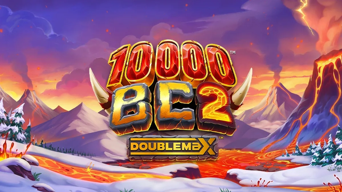 Cena do jogo 10000 BC DoubleMax 2 com mamute e vulcão